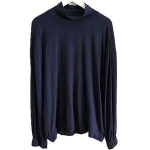 Denver Hayes black mockneck top